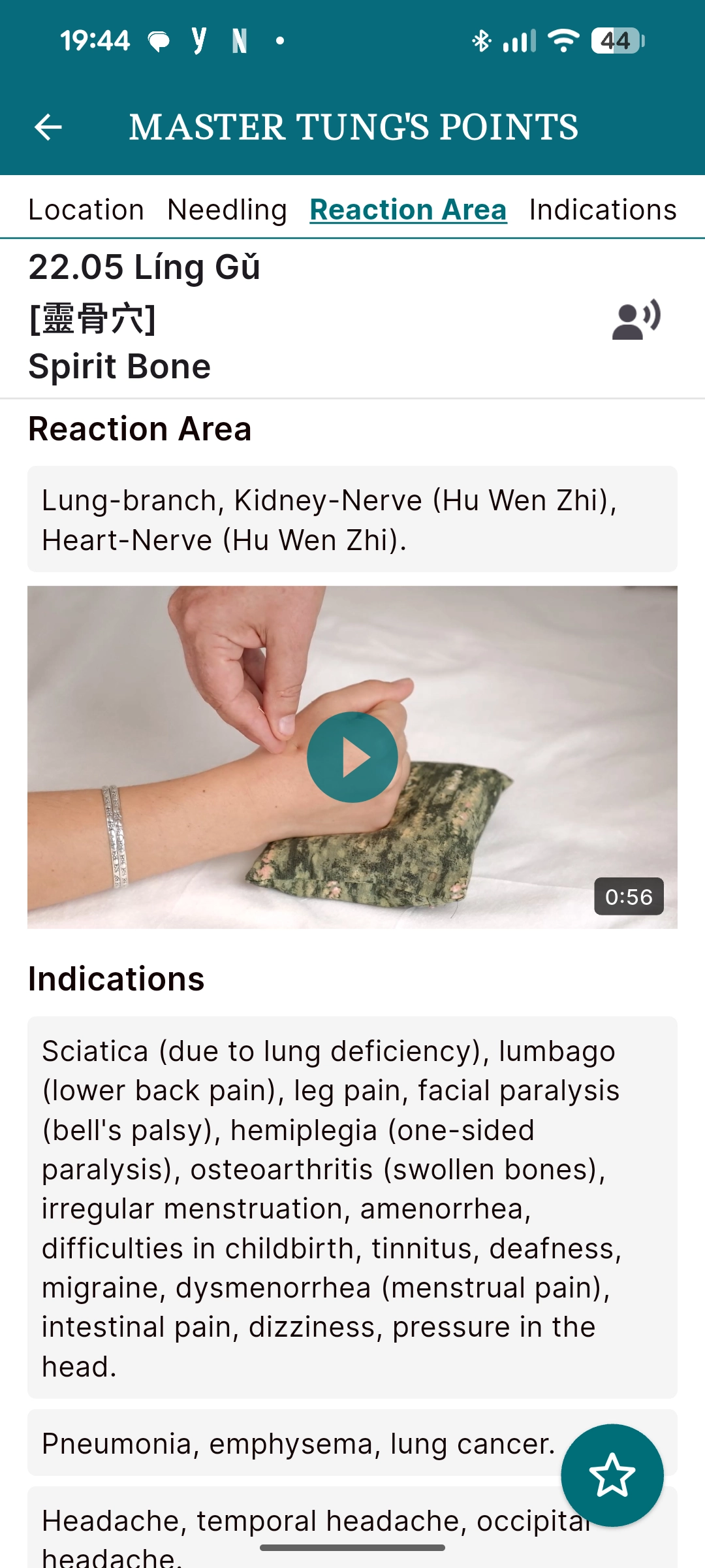 Master Tung's Points app showing point 22.05 Líng Gù (Spirit Bone) — reaction area, needling video and full clinical indications
